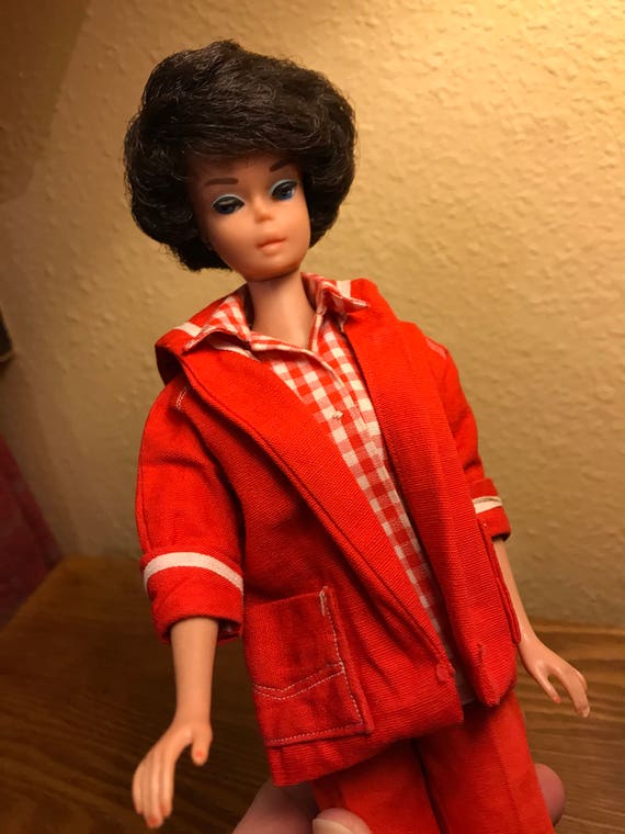 barbie doll with short black hair