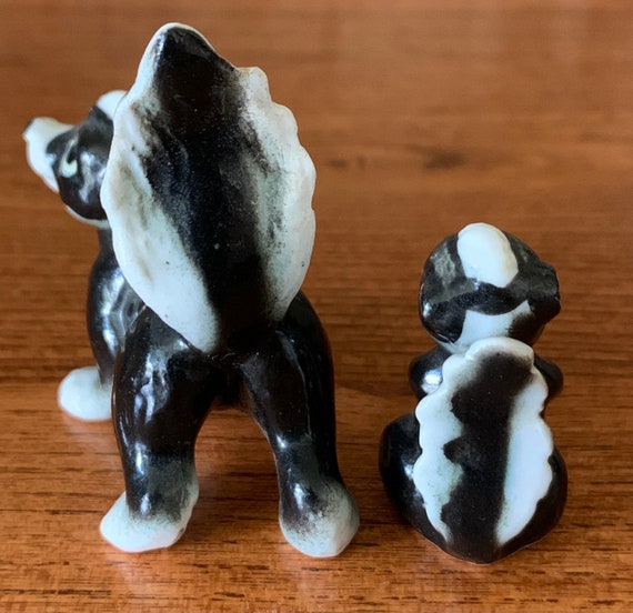 Vintage Porcelain Miniature Skunks Mother and Baby Figurines