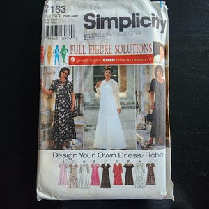 May include: A Simplicity 7163 sewing pattern envelope for a dress or robe in size GG 26W-32W. The front features the text Full Figure Solutions, 9 great looks, one simple pattern, and Design Your Own Dress/Robe, with illustrations of nine dress variations.