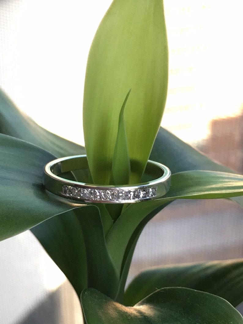 Channel set princess cut Diamond Ring in 14k white Gold 0.20Ct.