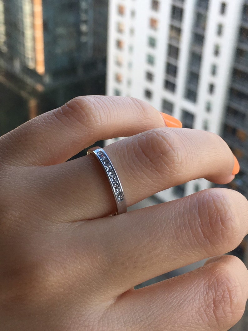 Channel set princess cut Diamond Ring in 14k white Gold 0.20Ct.