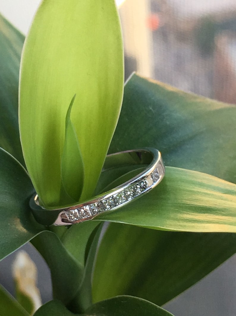Channel set princess cut Diamond Ring in 14k white Gold 0.20Ct.