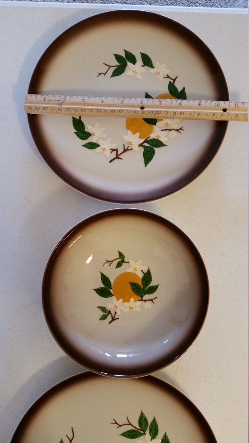 vintage orchard ware plates and bowl california retro 1950 era dinnerware oranges and blossoms ceramic hand decorated fruit decor kitchen