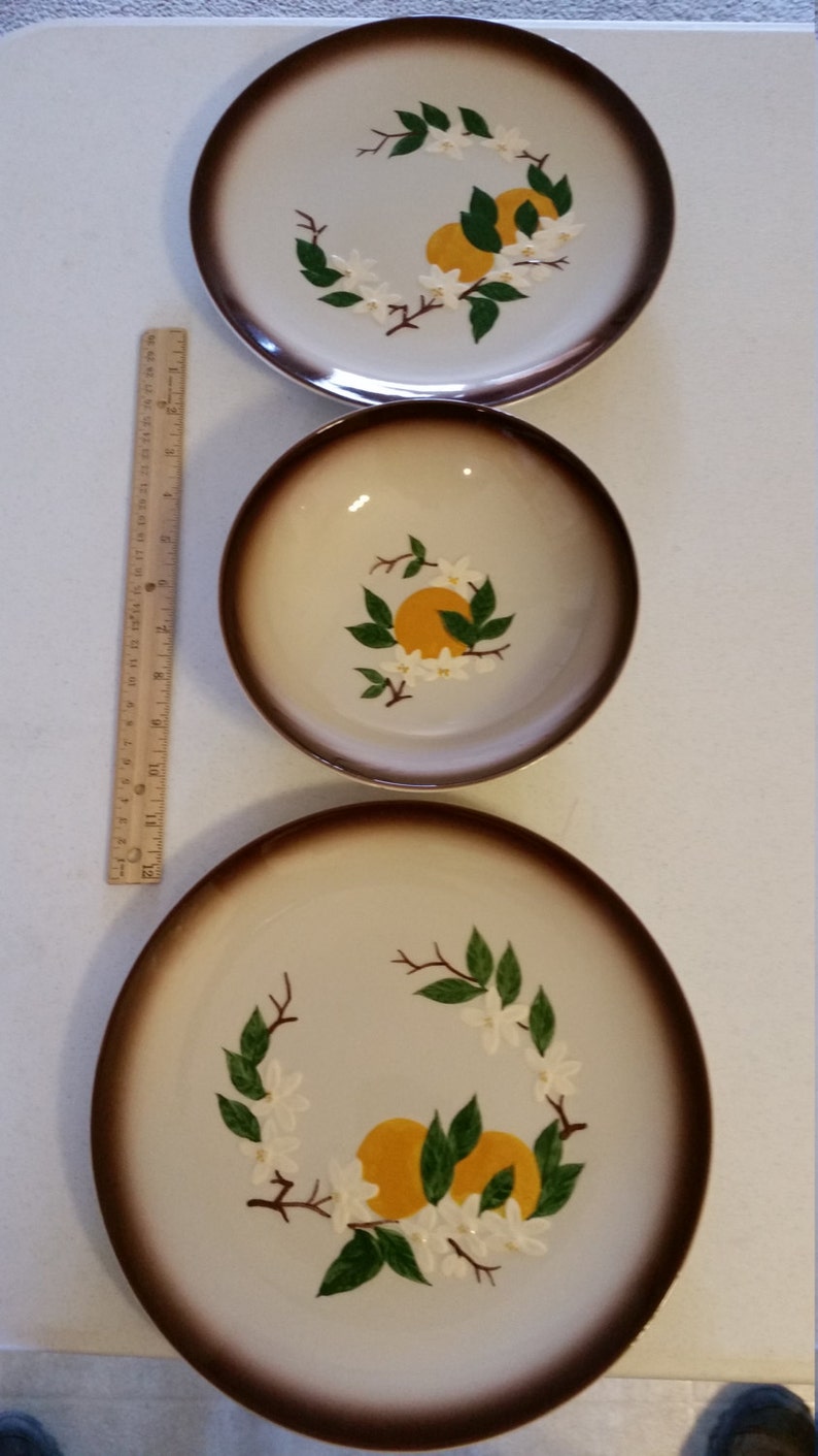 vintage orchard ware plates and bowl california retro 1950 era dinnerware oranges and blossoms ceramic hand decorated fruit decor kitchen