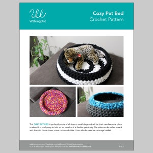 May include: A crochet pattern for a cozy pet bed. The pattern includes instructions for a black and white bed, a pink, purple, and orange bed, and a blue and gray bed. The pattern is titled "Cozy Pet Bed Crochet Pattern" and is from WalkingDot.