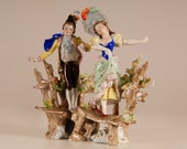 A pair antique German porcelain figurines Marked Dresden style saxe