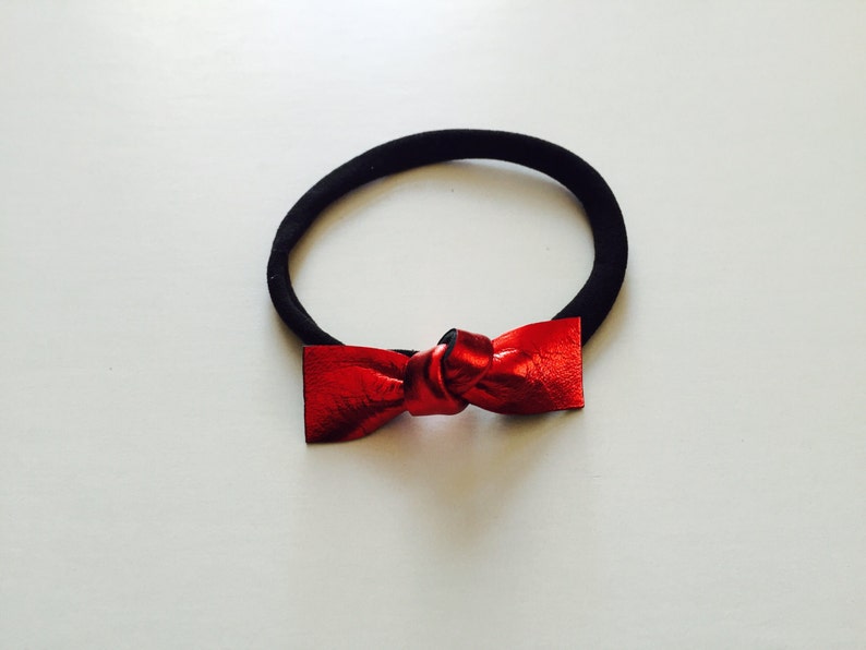 Red leather knot bow
