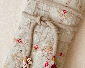 Linen cord waist belt with afghan tassels and cowrie shell