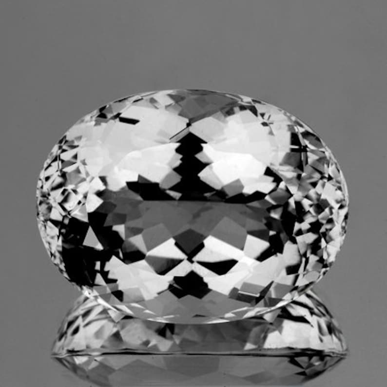 Flawless-VVS Clarity White Topaz 49.70 carat Oval 25x18 mm Natural Loose Gemstone for Jewelry