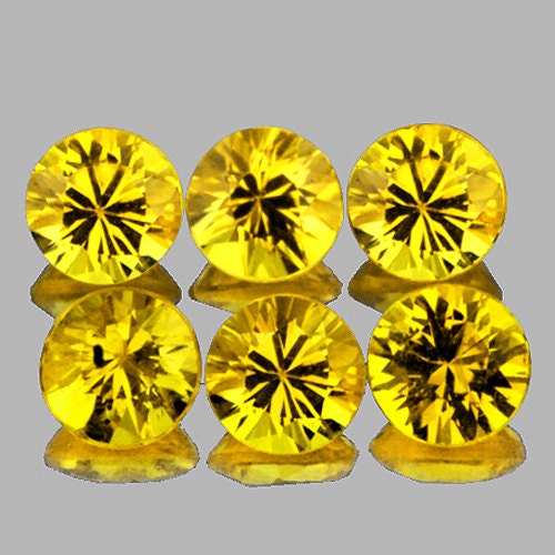 13 x 11 mm { 7.01 cts} 八角形エメラルドカット AAA ファイア