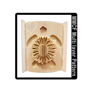 May include: A wooden cutout of a turtle with a sunflower in its shell. The cutout is designed to be assembled into a multi-layer pattern. MMCF Multi-layer Pattern.