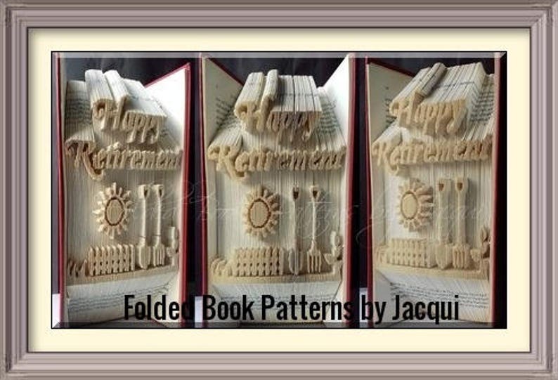 May include: A book folded into a three-dimensional sculpture of a house with the words "Happy Retirement" on the front. The house has a fence, a sun, and gardening tools.
