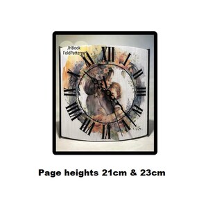 May include: A white clock with a roman numeral face and a floral design. The clock features a couple embracing. The clock is 21 cm and 23 cm tall. The text "JHBook FoldPatterns" is visible on the clock.