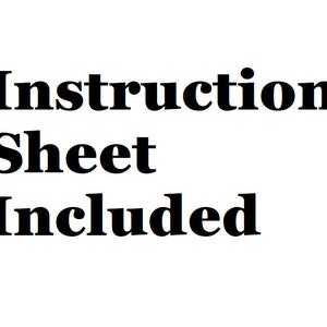 May include: Instruction sheet included. This is a black and white image with the text "Instruction Sheet Included" in bold font.