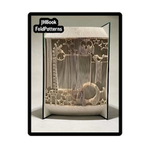 May include: A white book folded into a 3D sculpture of a giraffe, a moon, and stars. The book is titled "JHBook FoldPatterns".