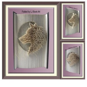 May include: A book sculpture featuring a wolf head profile created by folding pages, with the text Folded by LJ Book Art visible at the top. The design is set against a circular background within the book, displayed in three different angles.