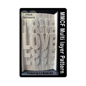 May include: A book folded into the shape of the word "LOVE" with the text "MMCF Multi layer Pattern" and "Folded by LJ Book Art" on the side.