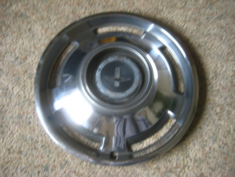 Monza Corvair 1965 Hub Cap. image 1