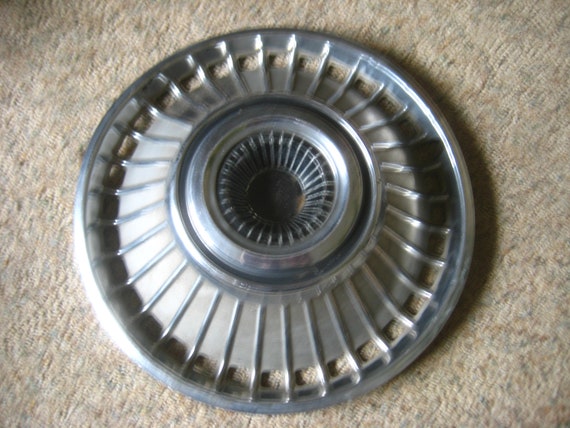 64 impala hubcaps deals