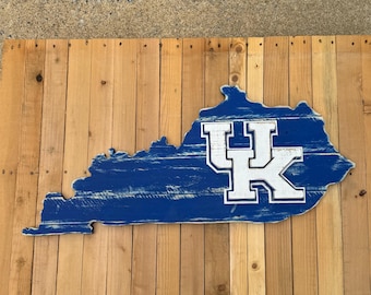 University of Kentucky blue-colored state of Kentucky wood pallet sign; White, blue, white UK stacked Kentucky logo in the center. Wildcats!