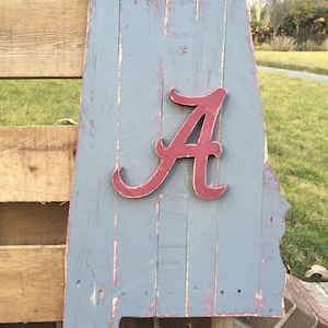 Gray University of Alabama wood pallet sign interlaced with Crimson; Crimson Alabama &quot;A&quot; logo in the center. Roll Tide.