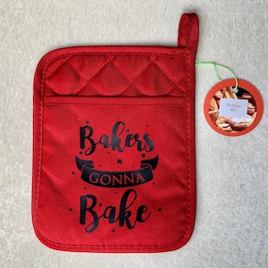Bakers gonna bake. Red oven mitt with black rubber backing and pocket