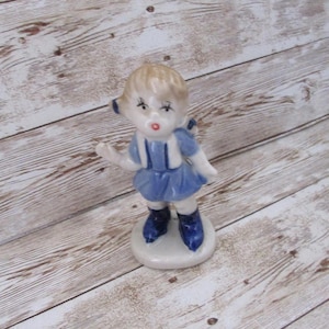 Vintage 1950 girl figurine blue white pig tail hair blonde light blue dress Germany figurine JanetJcrafts