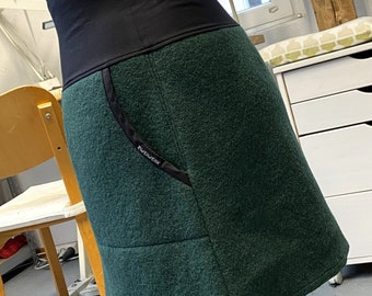 The walki in A-shape, wool skirt with pockets, dark green, ZWEIWERK