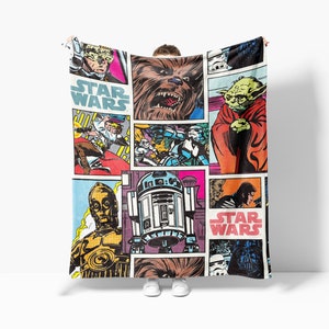 a star wars themed blanket with images of characters
