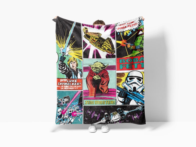 a star wars themed blanket hanging on a wall