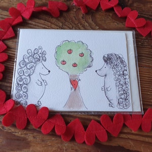 Carte hedgehogs Valentines. Dessiné à la main. Donc, dans l’amour