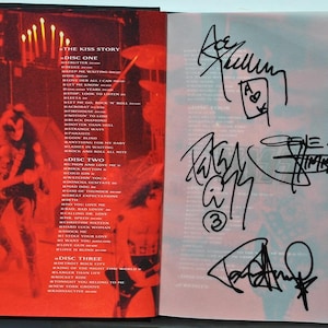 Kiss Signed Book X4 - The Kiss Story - 2001 - Gene Simmons, Peter Criss, Ace Frehley, Paul Stanley W/COA