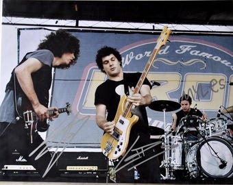 Wolfmother Signed Photo X3 – Andrew Stockdale, Myles Heskett, Chris Ross 11"X 14" W/COA