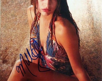 ミラ・ジョヴォヴィッチのサイン入り8x10バイオハザード写真 - Etsy 日本