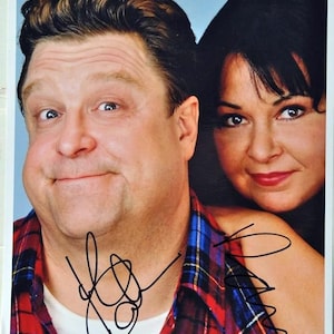 Roseanne Cast Signed Photo X2 – John Goodman & Roseanne Barr W/COA