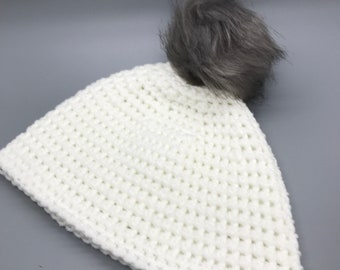 Crochet beanie with faux fur pompom
