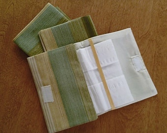 Cloth tissue holder.  Handy for purse & pockets