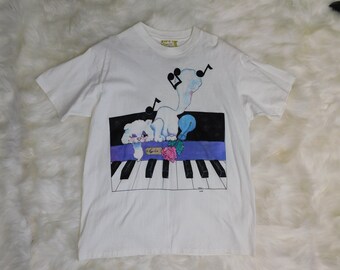 90s Tigre Lis by Karen Justice Cat on Piano T Shirt  Oversized
