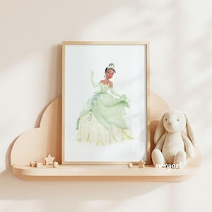 May include: A framed watercolor-style art print featuring a character in a voluminous light green gown with a tiara and gloves. The print is displayed on a light-colored cloud-shaped shelf next to a plush cream-colored rabbit toy and small stars.