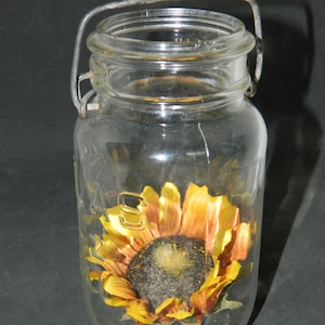 Heavy Glass Jar w/a Handle. A Country Kitchen Table or Shelf Decoration. Add Some Fresh Cut Flowers and Give as a Gift to a Friend