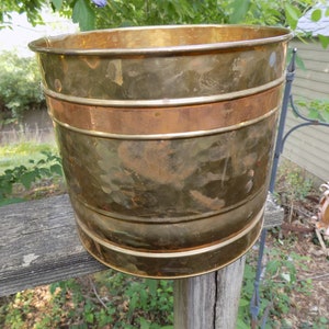 A Large Brass & Copper Planter or Bucket with a Copper Band Around the Top