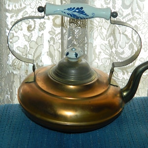 A Vintage Copper Kettle. A Rustic Tea Pot w/a Porcelain Handle & Knob For a Favorite Tea or Shelf Display That Gives a Old Time Country Feel