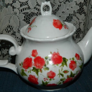 A Vintage White Floral Teapot w/Red Roses. A Nice & Glossy White Teapot with a Red Rose Design to Make and Enjoy Your Favorite Tea in.