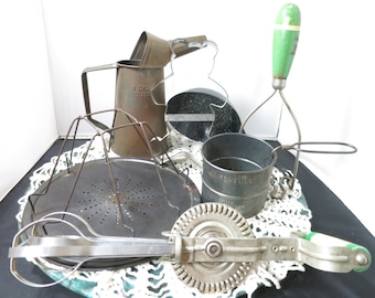 Vintage Choice Kitchen Gadgets  and Tin Pitcher/Oil Can Agate Pan Toaster Potato Masher Hand Beater 2 cups full flour sifter