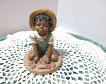 M Holcombe God is Love  figurine Tess 1989