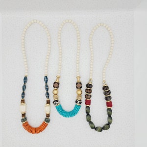 Statement necklaces with gold accents and fall toned beads