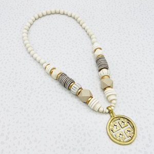Neutral beaded necklace with hexagon statement beads and gold accents