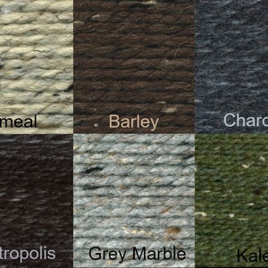 May include: Six yarn skeins in different colors: oatmeal, barley, charcoal, metropolis, grey marble, and kale.