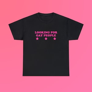 Looking for Gay People Unisex Heavy Cotton Tee Y2K Iconic Funny It Girl Meme Phrase Shirt Sassy Sarcasm Gift Unhinged Chaotic Viral Quote