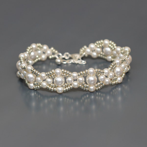 Women's white crystal bracelet with Miyuki round pearls and seed beads. Solid silver clasp